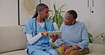 Talking, tablet and nurse with senior woman for checkup, consulting and medical report on sofa. Retirement, assisted living and caregiver with elderly patient on tech for health exam, support or help
