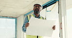 Construction, inspection and black man with blueprint for building planning, safety or security. Male person, contractor or civil engineer checking property with floor layout for maintenance on site