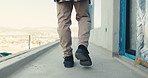 Feet, engineer and walking at site for construction, inspection and building design for expansion. Space, person and inspector on rooftop for supervision, quality assurance and architecture progress