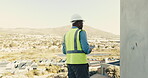 Construction, tablet or supervisor on site with evaluation, progress track or review on renovation. Inspection, space or man outdoor with tech, quality control or assessment in remodeling project.