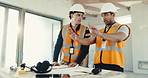 Engineer, team and men in building, discussion and planning for property development with blueprint. Creative, ideas and people with paperwork, collaboration and colleagues with renovation project