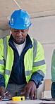 Architect, meeting and planning with team for construction safety, security or building design. People, group or civil engineer with documents for brainstorming structure or architecture development