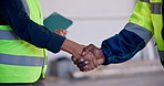 People, architect and meeting with handshake on construction site for building agreement or deal. Contractor, civil engineer or shaking hands with introduction for partnership or onboarding project
