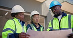 Architect, team or discussion with blueprint on construction site for building strategy or design. People, contractor or civil engineer with group or floor layout for architecture project or planning