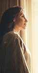 Morning, woman and reflection in hotel room with window, travel and planning for peaceful vacation. Calm, mature person and thinking in accommodation with self care, wellness or daydream for holiday.