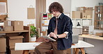 Man, tablet and typing in small business for logistics, order info and inventory update on website. Entrepreneur, tech and connectivity in startup for social media engagement, stock control or stylus