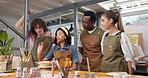 People, teacher or students in ceramic art class for creative skill, education or learning together. Group, artistic designers or painting with artist tips for brush instructions, guide or process