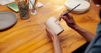 Pottery, drawing and hands with cup in&nbsp;workshop, creative and painting heart shape with paintbrush. Artisan, craftsmanship and person with handmade mug, above and art process with equipment or color