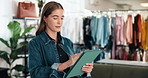 Fashion, tablet and woman in clothing store for inventory review, online sales or small business. Tech, person or boutique entrepreneur with style merchandise, scroll retail catalog or startup stock