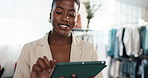 Fashion, tablet and happy woman in clothing shop for stock review, online sales or small business. Tech, black person or boutique entrepreneur with style update, scroll retail catalog or inventory