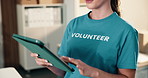 Volunteer, hands and research in charity with tablet, donation website and typing non profit report. Woman, outreach and browse with tech, social responsibility and online application for NGO grant.