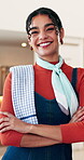 Hospitality, face or woman in cafe with arms crossed, catering service or owner of dining business. Happy, portrait or restaurant entrepreneur with laugh, about us or confidence in culinary industry