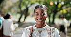 Face, woman and laugh at college with backpack, pride and optimistic for future in higher education. Happy, person or student outdoor at university with bag, positivity and learning with scholarship.