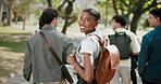 Students, face and walking with friends, outdoor and conversation with group and laughing together. Portrait, education and funny discussion with happy people, bonding and travel on university campus