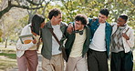 Happy, peers or university student in park with walk, group hug or connection in higher education. Diversity, laughing or people with embrace, friends bonding or college support in study opportunity.