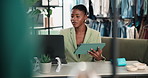 Fashion, woman and tablet in retail store with laptop, research and update catalog for ecommerce app. Boutique, owner and black person with tech for planning, website and check stock on online shop.