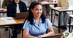 Face, woman and student in class with laptop, online research and university lecture for knowledge. Portrait, female person and smile at campus with tech, academic assessment and course for education