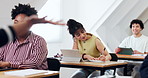 Woman, student and writing in class with notebook, learning and university lecture for knowledge. Smile, people and teacher at campus with laptop, academic notes and lesson information for education