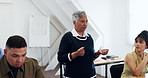 Woman, teacher and walking in class with students, learning and university lecture for knowledge. Mature professor, talking and people at campus for discussion, academic course and education guidance
