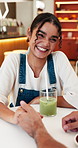 Couple, woman and holding hands in cafe with boyfriend, matcha and date for quality time on weekend. Happy, person and flirting in coffee shop with romantic partner, bonding or love for relationship.