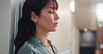 Teacher, woman and thinking at college with stress, breathing and fatigue from higher education job. Bokeh, professor and mature person at university with reflection, anxiety and exhale with burnout.