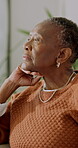 Senior, woman and relax in home with thinking, quiet introspection or peaceful solitude on sofa. Elderly, black person and serious in house for retirement reflection, nostalgic memory or calm morning