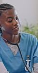 Listening, stethoscope and nurse with patient in home for medical service, health exam or assessment. Healthcare, talking and caregiver with person for breathing test, consulting and cardio wellness