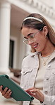 Student, woman and scroll at college with tablet, browsing and download AI for learning assistance. Happy, person and outdoor at university with tech, app and digital innovation for higher education.