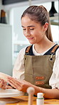 Smile, woman and mold in workshop for pottery, sculpture and custom design of handmade craft. Person, admiration or ceramic in class with clay plate, artistic process and course of porcelain creation