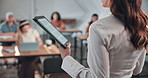College students, education and lecturer with tablet in classroom, lesson or explain project on web. Professor, talking and people with tech, knowledge and advice for academic growth in university