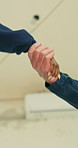 Engineer, meeting or handshake with deal on construction site for teamwork, project or agreement. Below, civil architecture or people shaking hands for support, partnership or building development