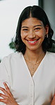 Office, real estate and face of woman with arms crossed, confidence and pride for housing agency. Professional, realtor and portrait of happy person for property management, consultant and about us