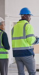Construction, team and building inspection with tablet for design vision, cad review and update. People, architect and foreman with back for site visit, remodeling progress and spatial layout on tech
