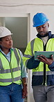 Construction, people and building inspection with tablet for design vision, cad review and update. Team, architect and foreman with tech for site walk through, spatial layout and remodeling progress