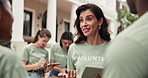 Community service, volunteer and talk with tablet, outdoor or explaining task assignment on website. Charity, team and happy people with tech, social responsibility and discussion with NGO schedule