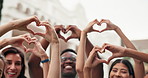 Happy, community and team with heart hands in city for love, outdoor mission or unity together. People, group or shape with like emoji, romantic gesture or symbol for global social outreach or care