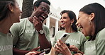 Volunteer, laughing and friends with phone, outdoor and social responsibility for community service. NGO, people and happy team with mobile, humor and reading funny post on web or bonding on break