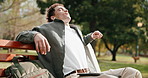 Student, man and relax with laptop on park bench for finished assignment, tasks or assessment. Male person, academic learner or stretching with computer for break, rest or outdoor productivity