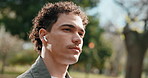 Student, man and listening with earphones in park for outdoor music, audio streaming or podcast. Male person, relax and breathing with sound or app in nature for fresh air, break or rest on campus