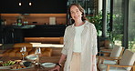 Face, woman and happy in home for table setting, casual get together or ready for guest arrival. Smile, mature person or tableware preparation for weekend gathering, social event or setup for hosting