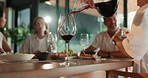 Happy, wine and friends in home for dinner party, celebration and social gathering on weekend. House, hosting and people with conversation, reunion and alcohol for bonding, connection and visit