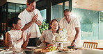 Candles, friends and people with birthday cake in home for celebration, party and milestone together. Applause, cheer and mature men and women with wish, social gathering and dessert for special day