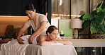 Towel, masseuse and woman at spa for back massage, holistic treatment and pamper at resort. Hospitality, prepare and person with therapist for healing, stress relief and wellness for salon service