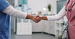 Healthcare, deal or women in hospital with handshake, greeting or cooperation with treatment plan. Intro, collaboration or nurse with shaking hands, agreement or opportunity in medical partnership.