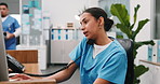 Woman, nurse and call at reception with computer, appointment and contact patient for treatment. Person, telephone or pc at clinic with document, medical inquiry and assistance for healthcare service