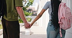 College, student or couple on campus with holding hands, connection or bonding in study opportunity. Walk, back or people with bag, romantic moment or academic development in university relationship.
