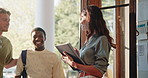 Teacher, students and walk in college with greeting, class register and welcome at lecture hall door. Happy, professor and people at university with arrival, morning and book for attendance record.