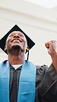 Student, graduation and happy man with fist pump in university ceremony for academic success. Excited, male person or graduate winning with smile or hat for education, victory or learning achievement