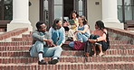 University students, conversation and relax at steps outdoor for development break, laugh or joke. College, happy people and friends on stairs at campus for academic chat with lecturer on tablet