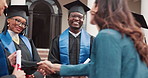 College, handshake and teacher with student for graduation, celebration and milestone for education. Happy, people and campus with ceremony, degree and success for achievement or university diploma